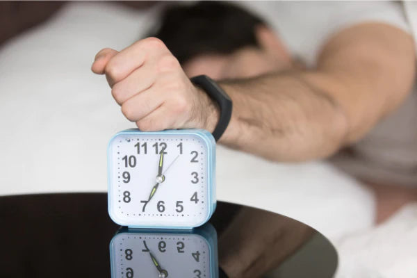 clock and man | sleep hygiene