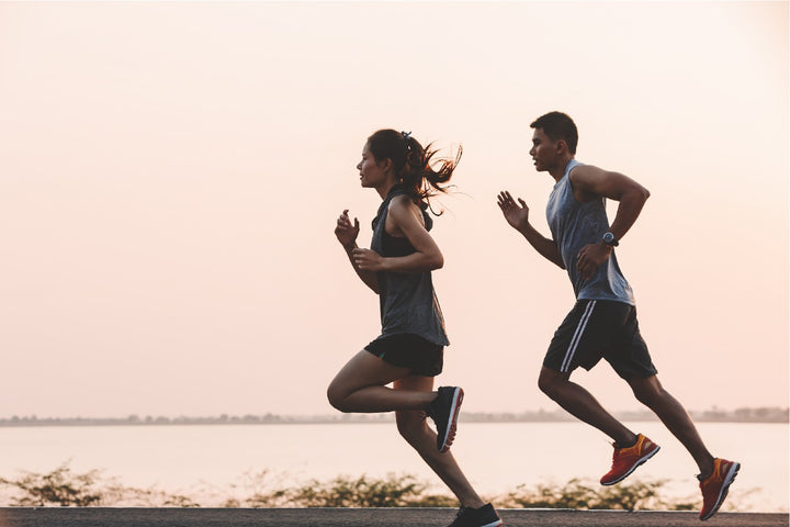 a man and a woman jogging 